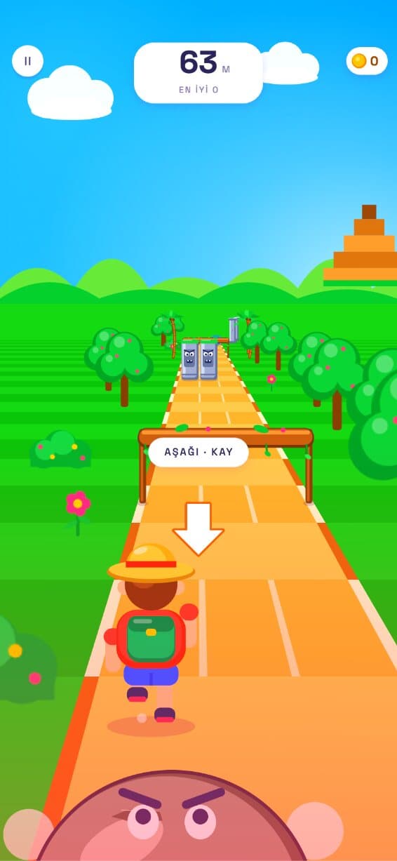 KOSU gameplay: a runner sprints along an orange track through green hills, with a duck prompt ahead and a chaser behind