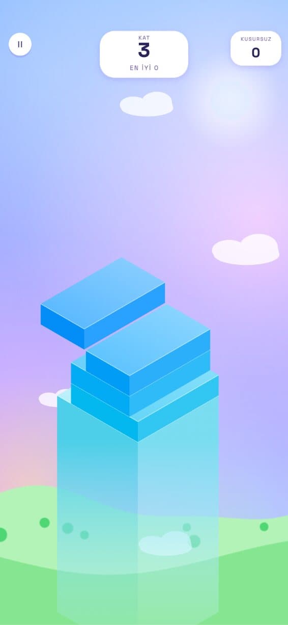 KULE gameplay: a tall isometric tower of stacked purple and gold slabs rising into the sky