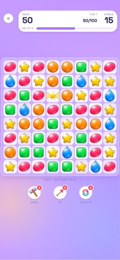 SEKER gameplay: a match-three board of colourful candies with a move counter, target bar and power-up buttons